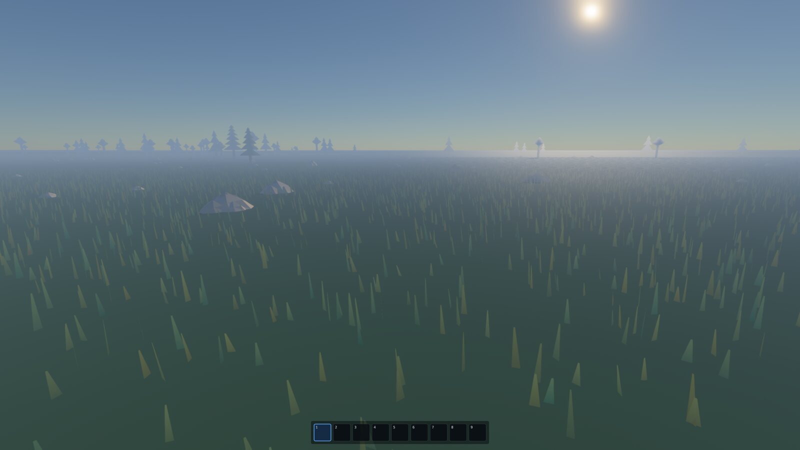 Sun low over a hazy green plain